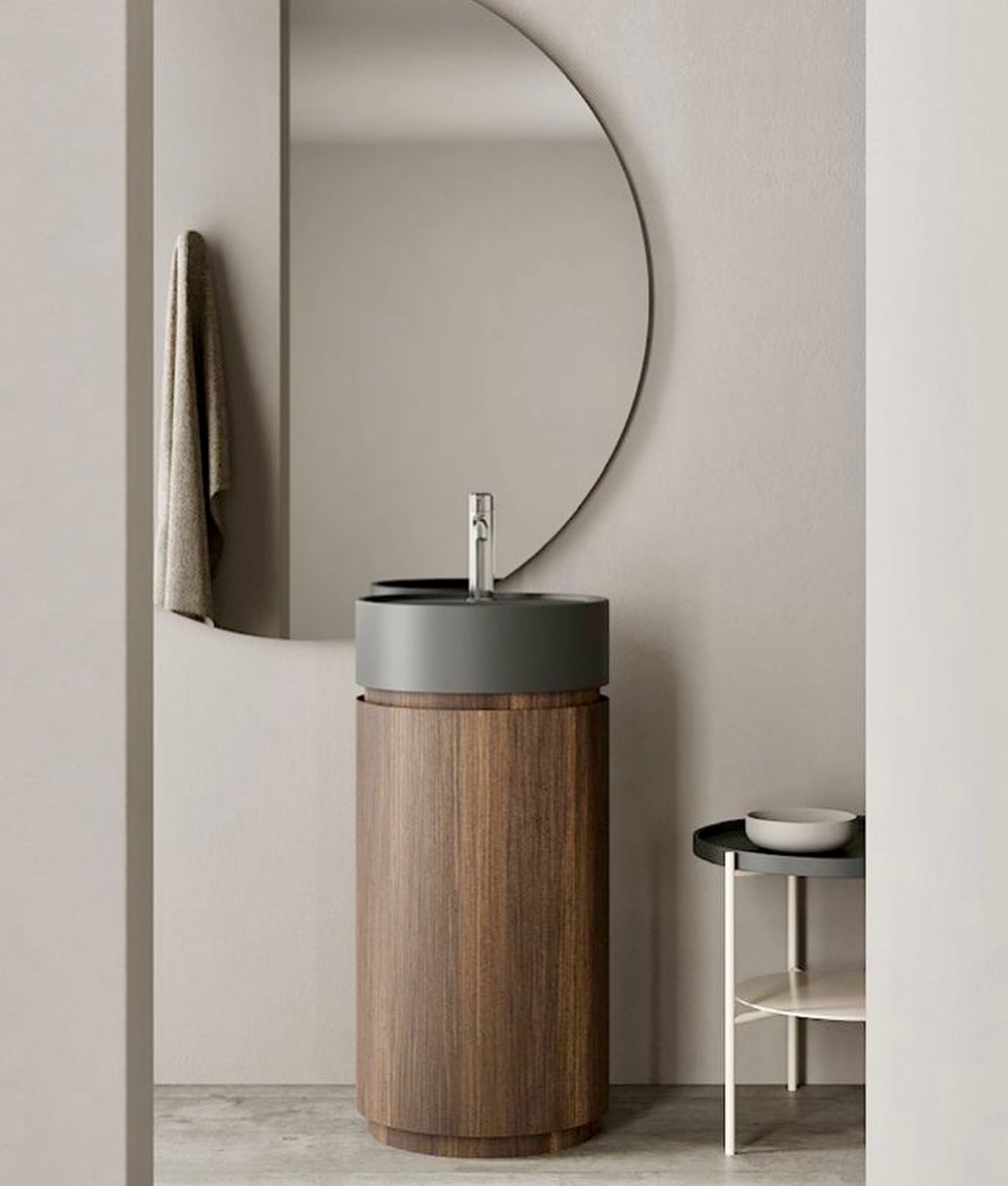 Cylindrical freestanding washbasin in ceramic in matte Cenere, and base in wood, collection Mod, from NIC Design