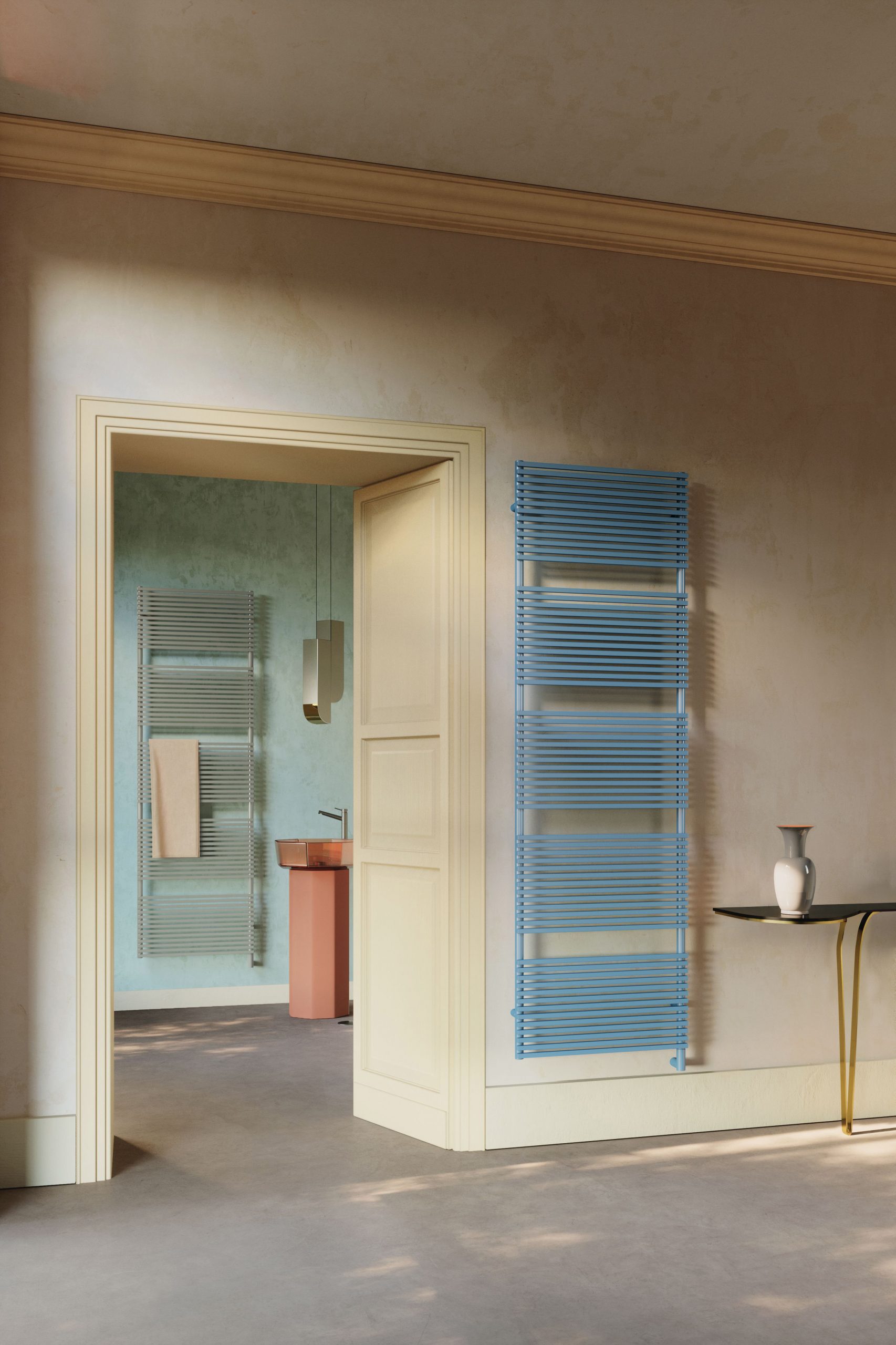 Grey and blue heated towel rails from Tubes, collection Kubik