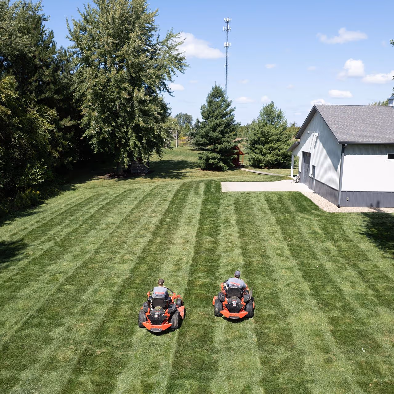 aerial view of Vision Lawn and Property Management lawn care crew servicing a property in Berrien County, Michigan