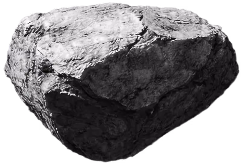 Close-up of a rugged, gray stone with textured surface.