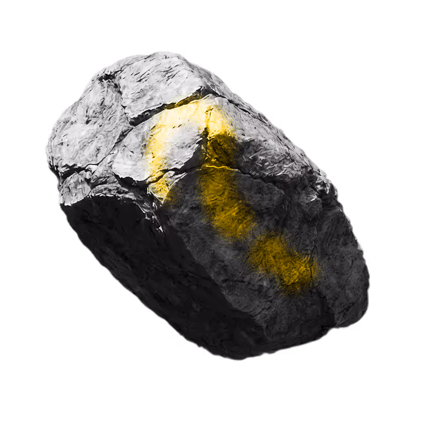 Close-up of a large gray rock with a rough texture and a yellow painted arrow on its surface.