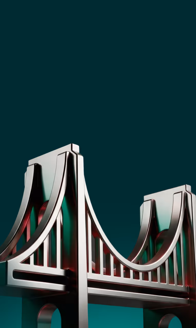 Three young men focused on their work at a desk in a bright office with plants and large windows.