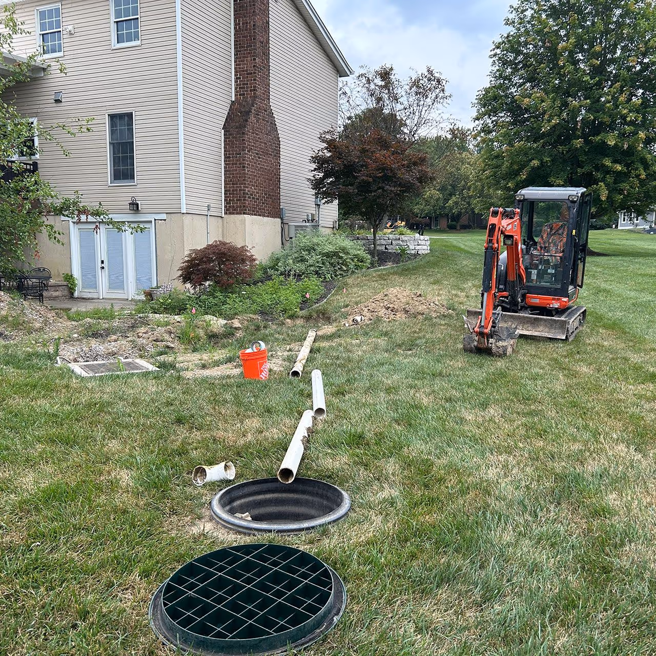 Lawn drainage solutions to protect foundation