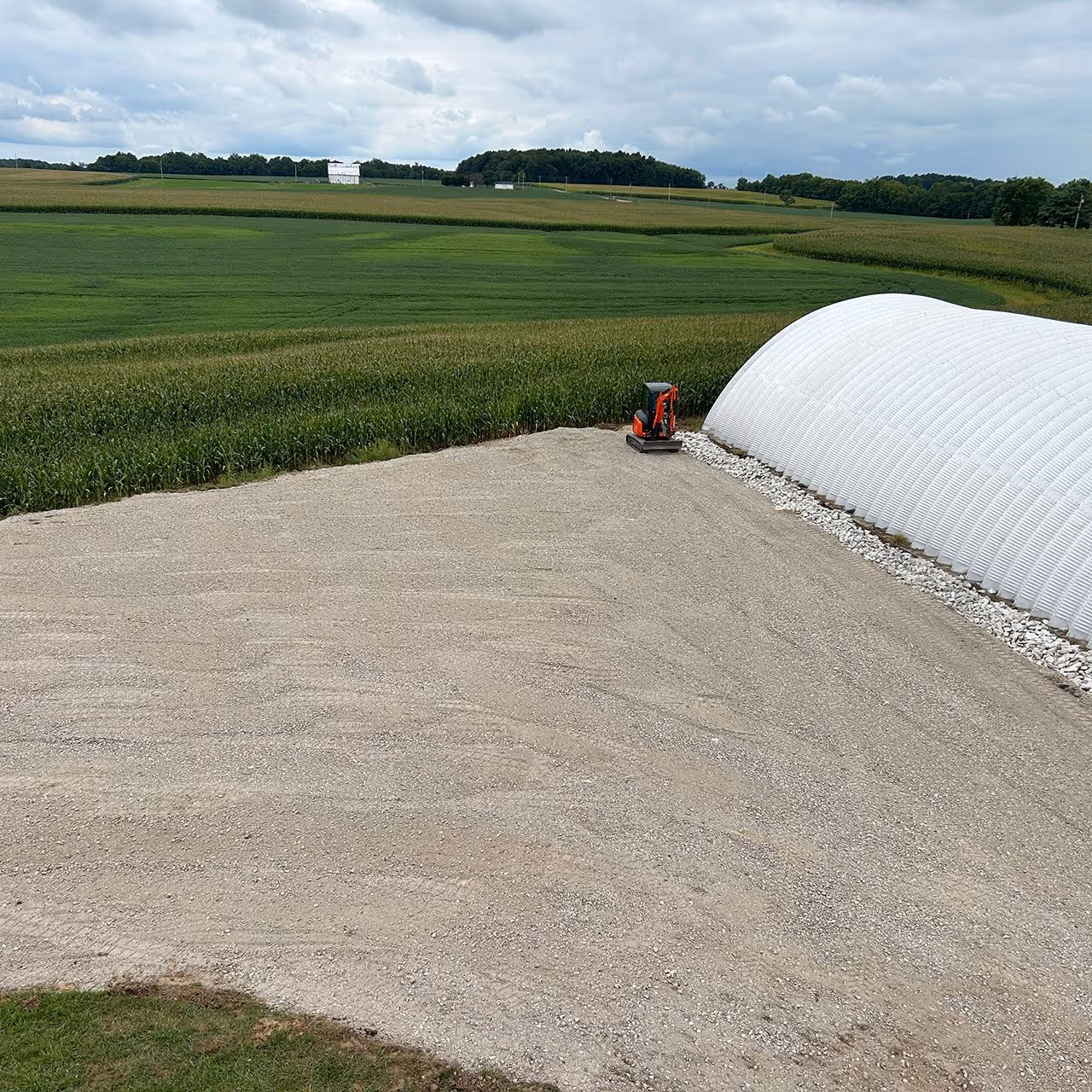 Properly graded gravel driveway base installation