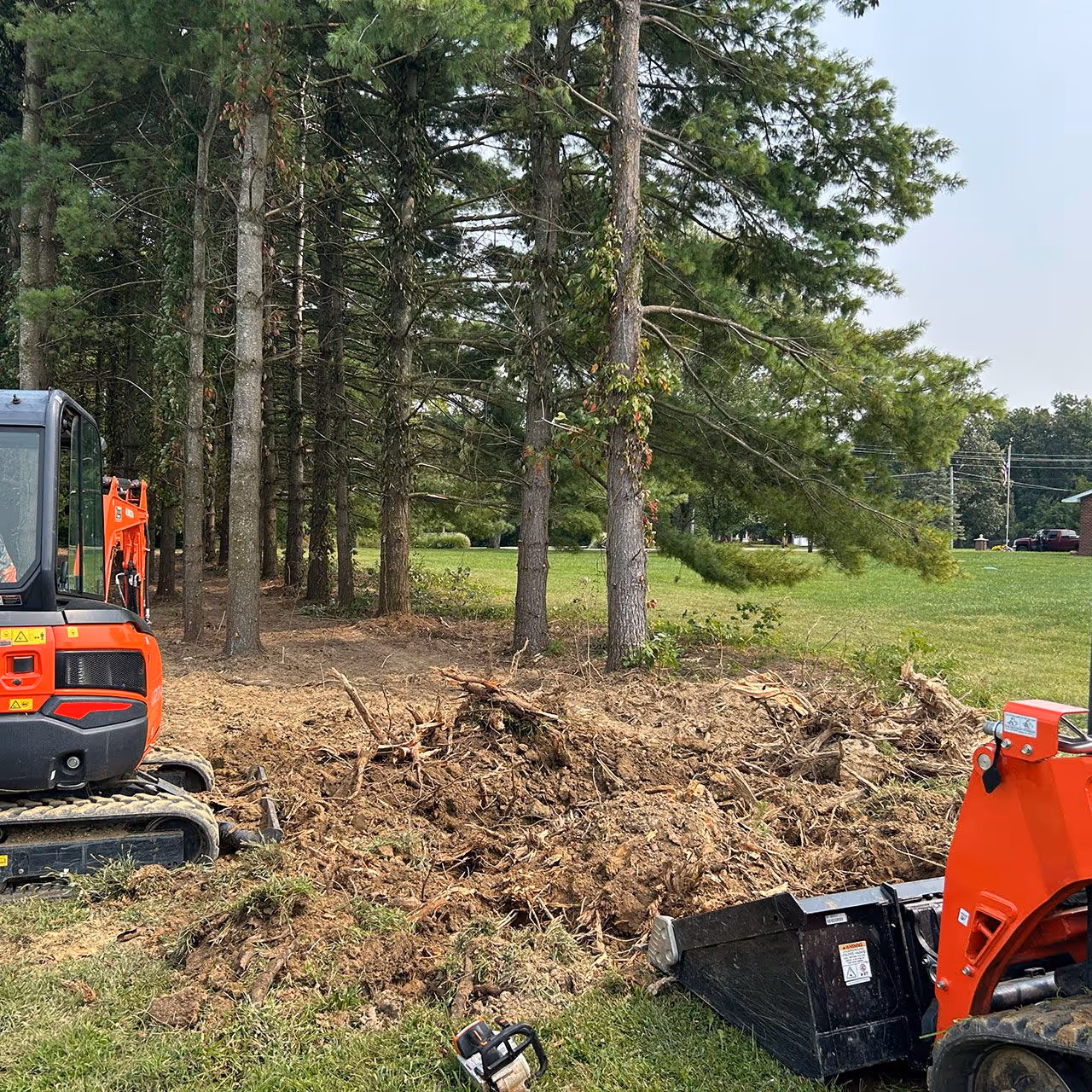 Baker Outdoor Services team on excavation site