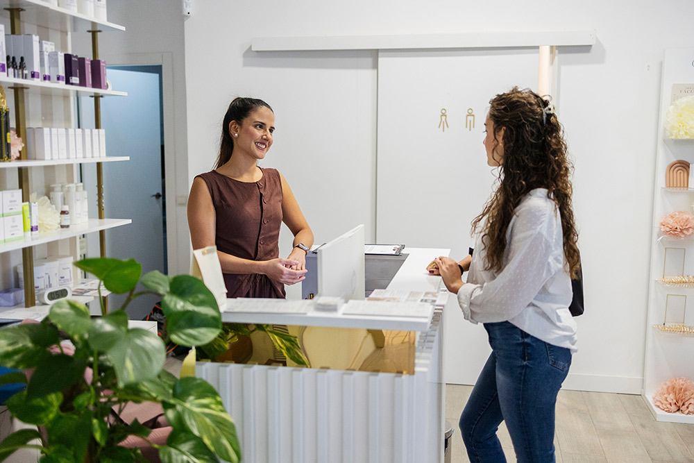 Modern aesthetic clinic with clean, organized front desk area
