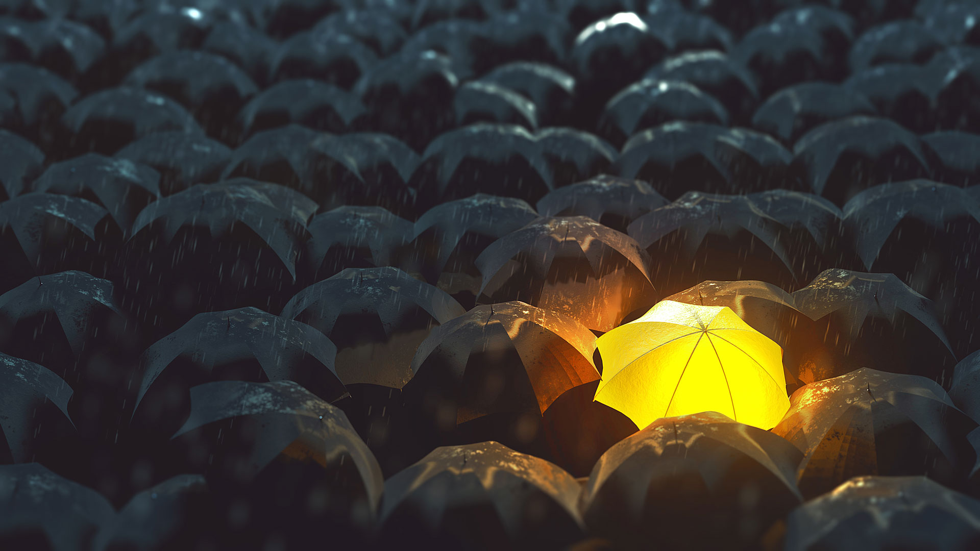A glowing yellow umbrella standing out among many dark umbrellas in the rain.