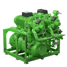 Motor industrial verde con tuberías y estructura metálica en soporte rectangular.