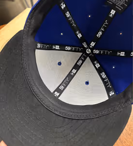 Inside of embroidered NewEra Cap