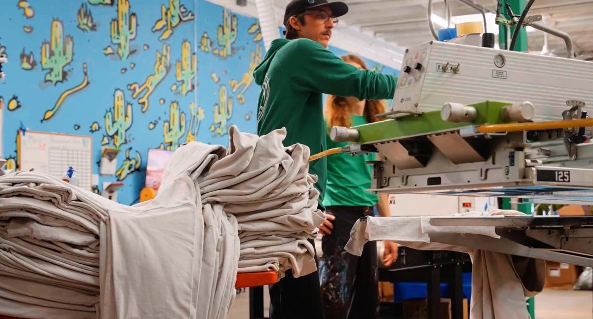 Automatic Screenprinting Press with operators