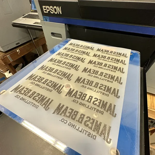 A sheet of DTF transfers printed on an EPSON DTG Printer