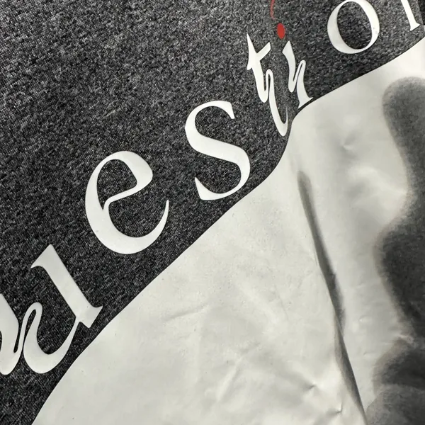 Closeup view of a DTF Transfer on polyblend t-shirt