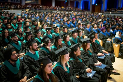 Seated Bow Valley College graduates at Jack Singer Hall