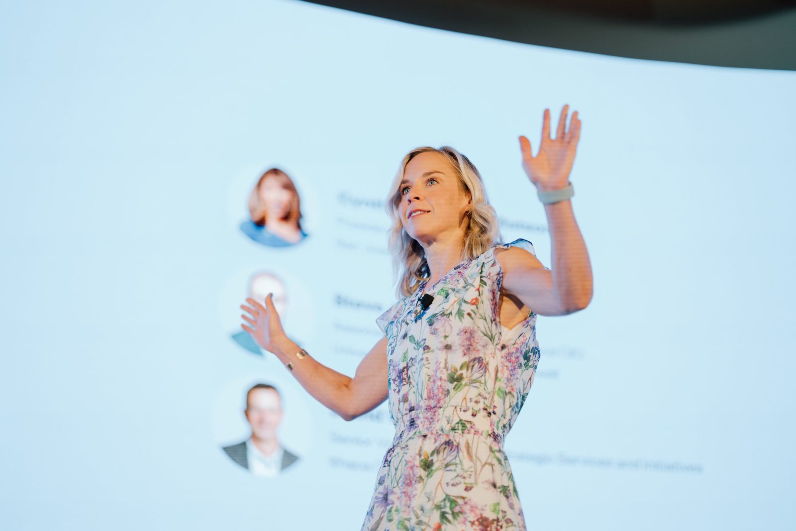 A speaker presenting to a Rooted seminar audience