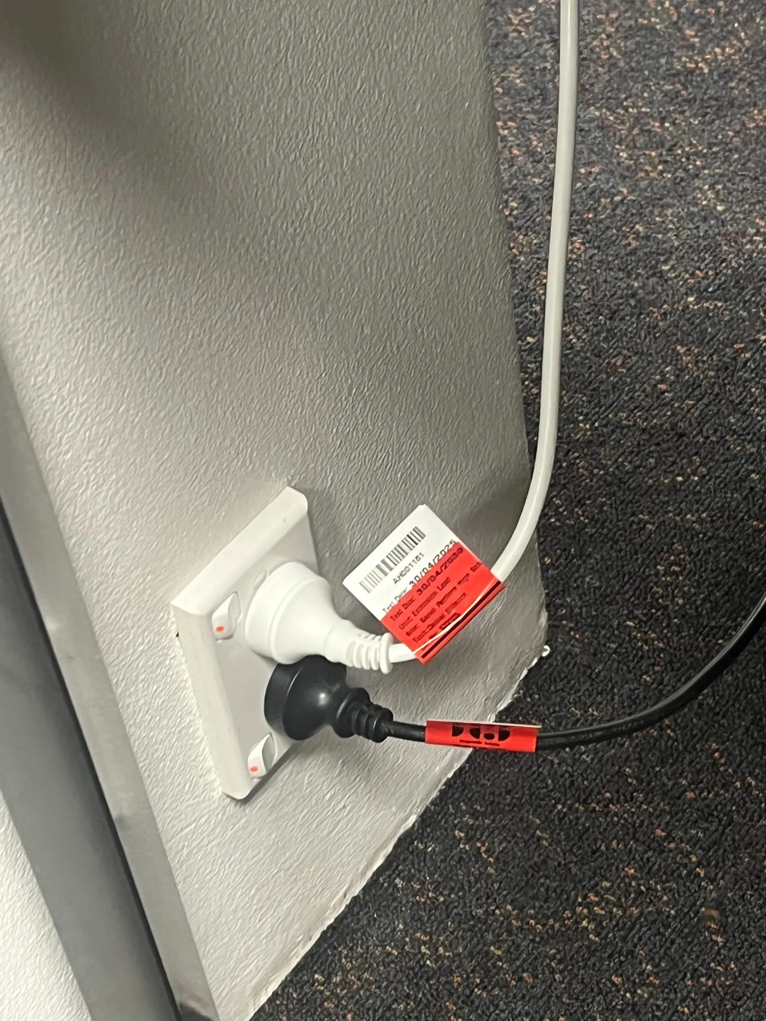 An individually identified extension lead with a test label.