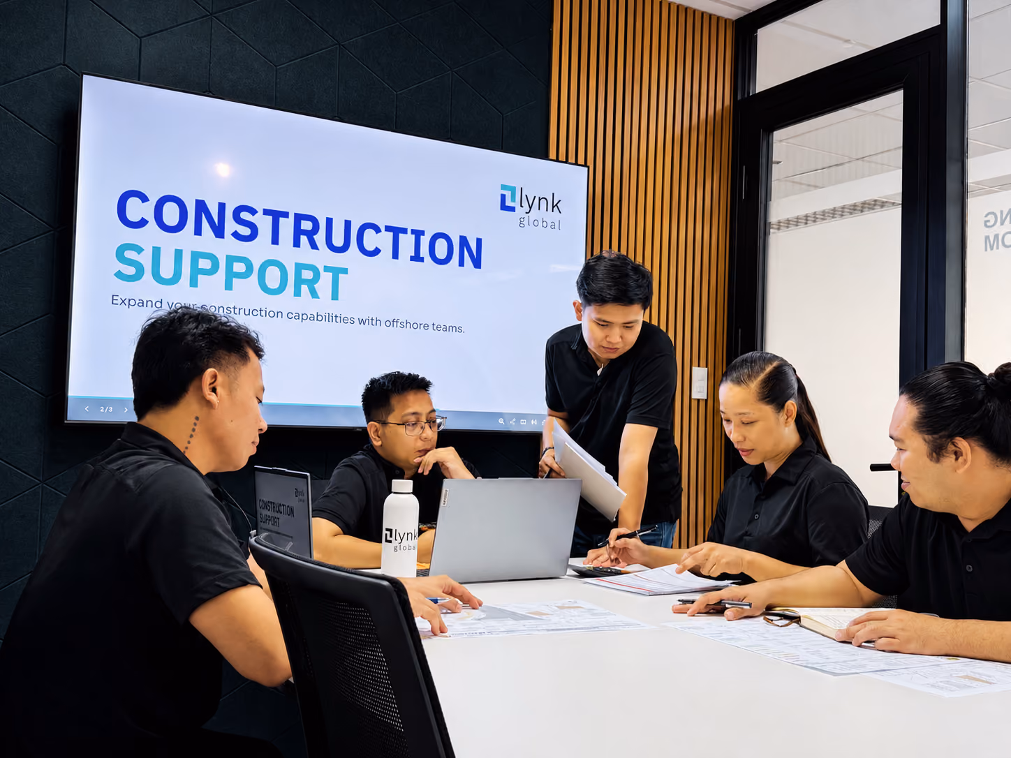 Workstations and equipment in the office setup used by Lynk Global