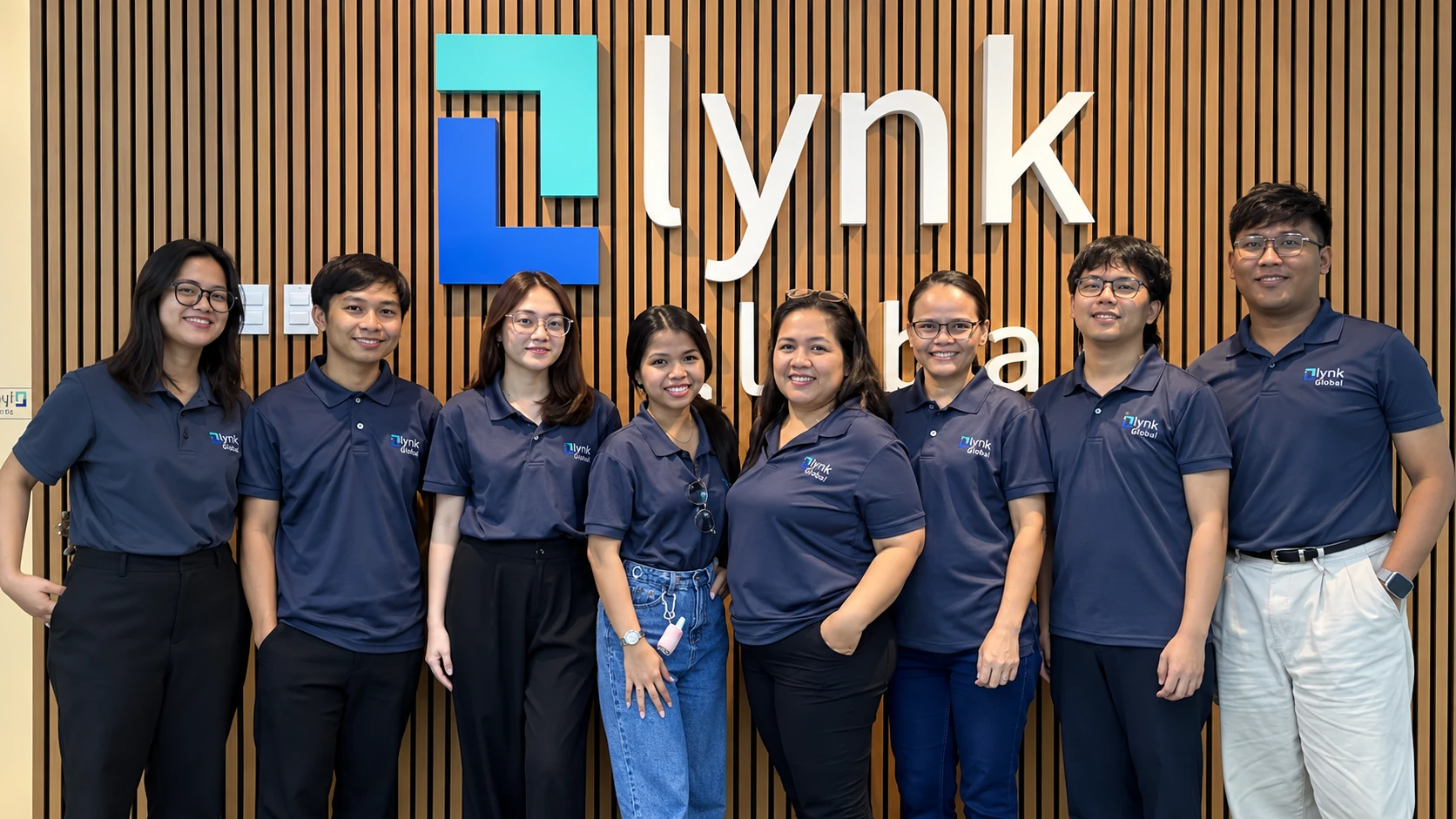 Lynk Global team members at the Manila office