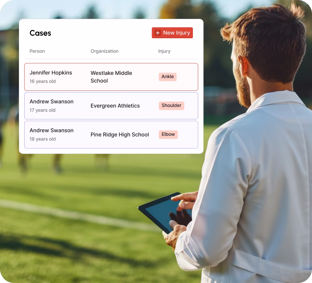 Athletic trainer in a white coat holding a tablet with a digital interface showing injury cases, including urgency and body parts injured.
