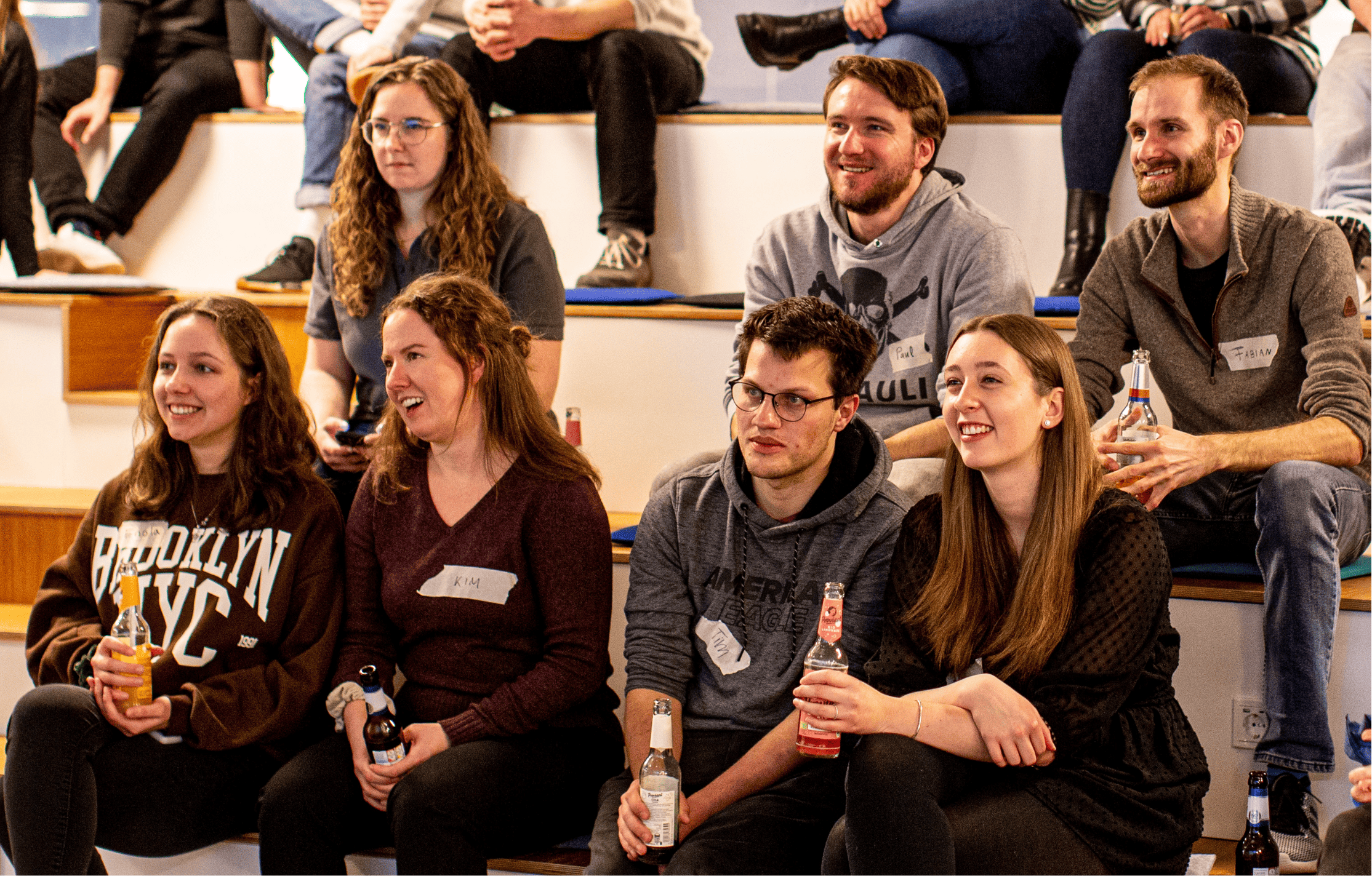 A group of people listening during a presentation