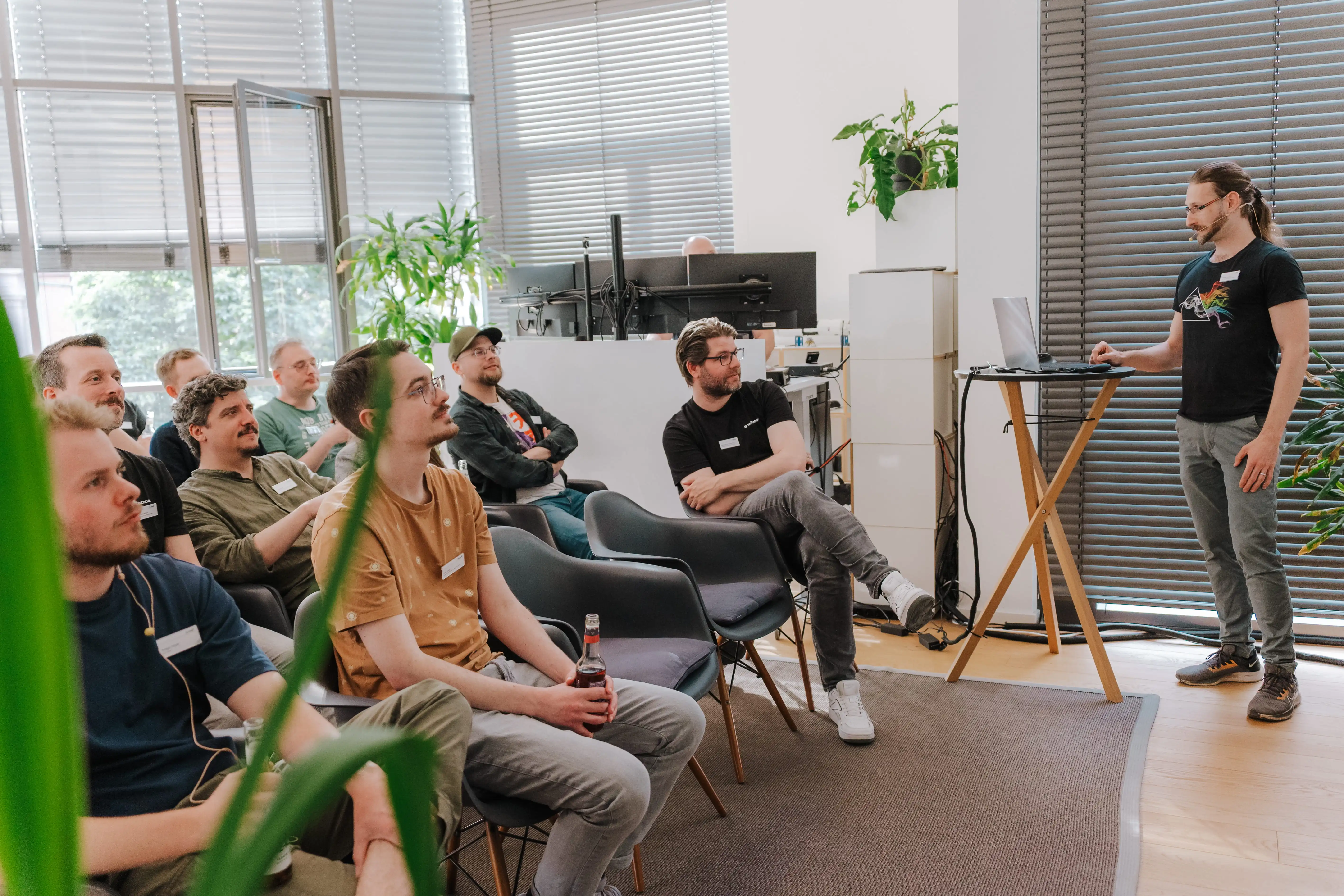 A group of people listening during a presentation