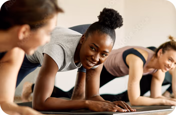 A group of women in a yoga class.
