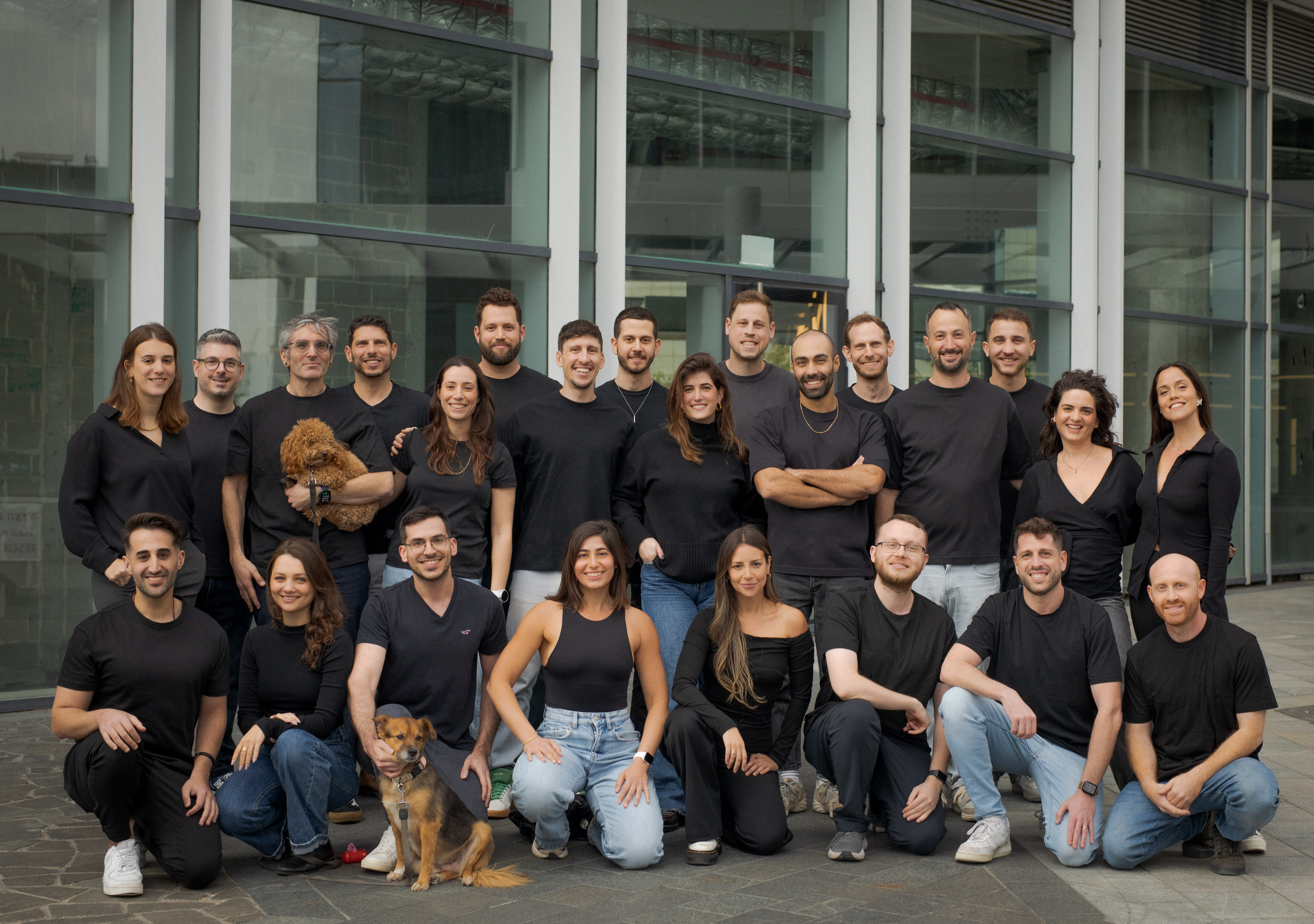 The Venice team standing together outside the office
