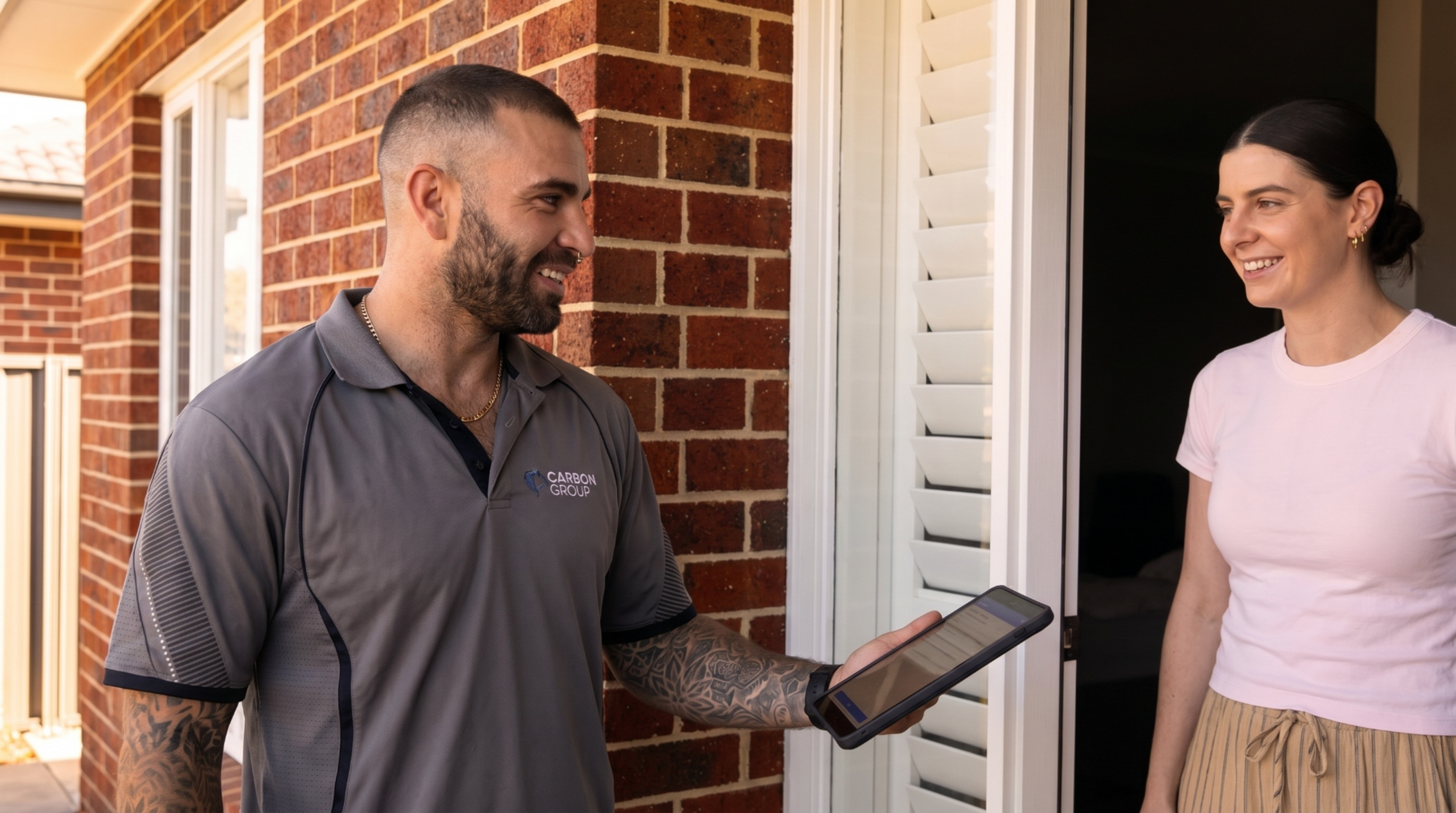 Brandon Loebert, Carbon Group Electrical — greeting a customer at their Melbourne home