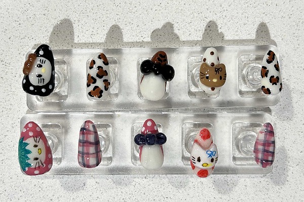Full set of kitty nails on plastic display set