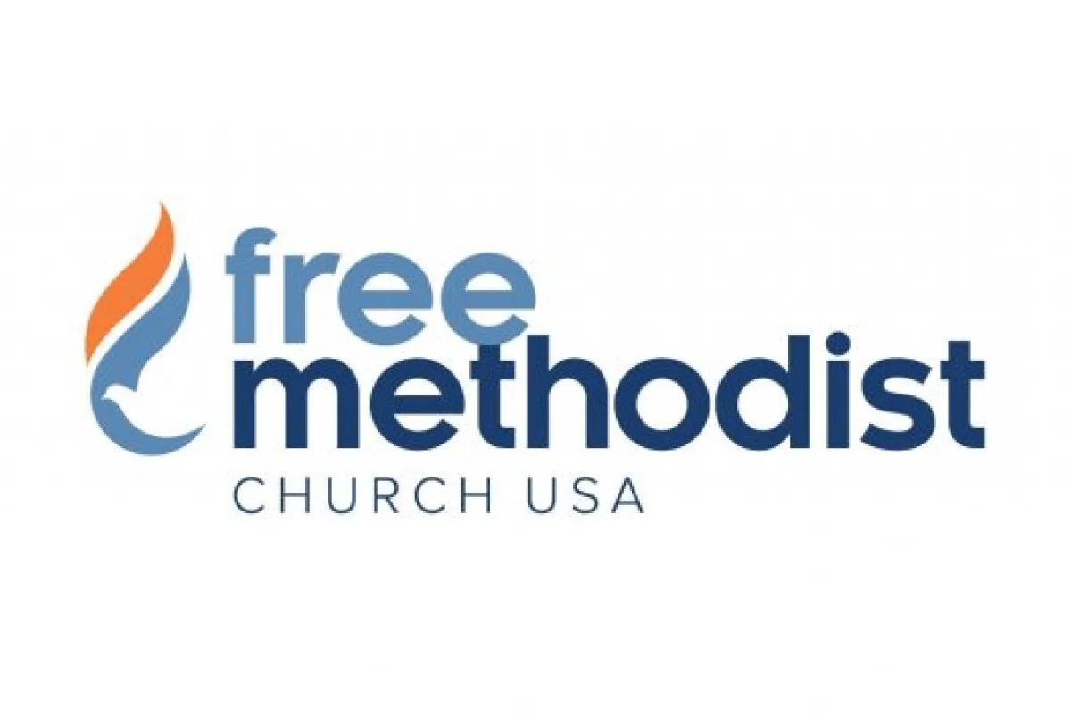 Logo of Free Methodist Church USA featuring a stylized blue and orange flame next to the text 'free methodist CHURCH USA'.