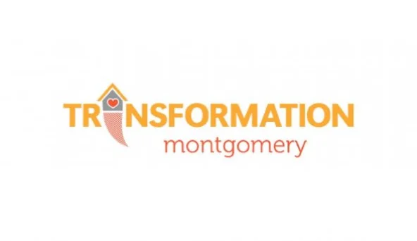 Logo with the word 'TRANSFORMATION' in orange and 'montgomery' in red below, featuring an abstract house shape with a heart replacing the 'A'.