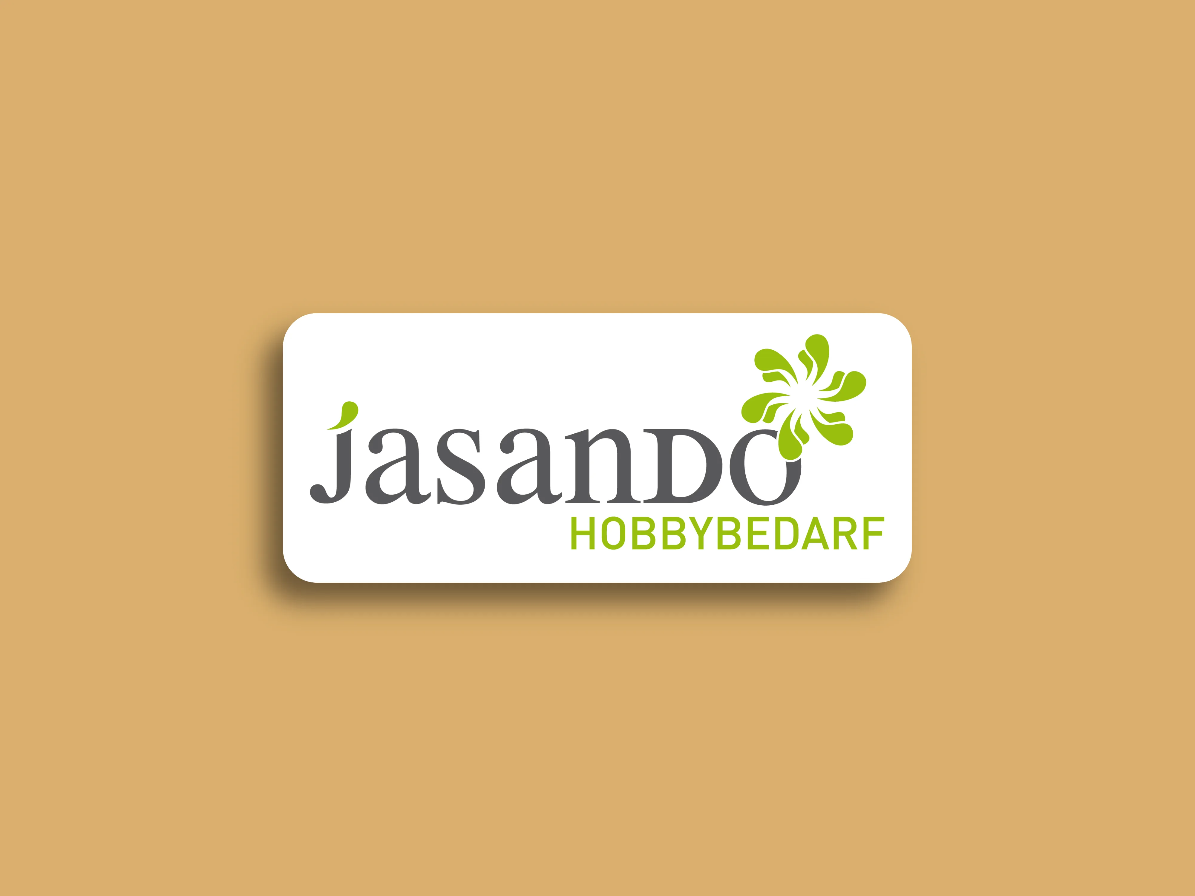 Das Logo von Jasando auf beigem Hintergrund.