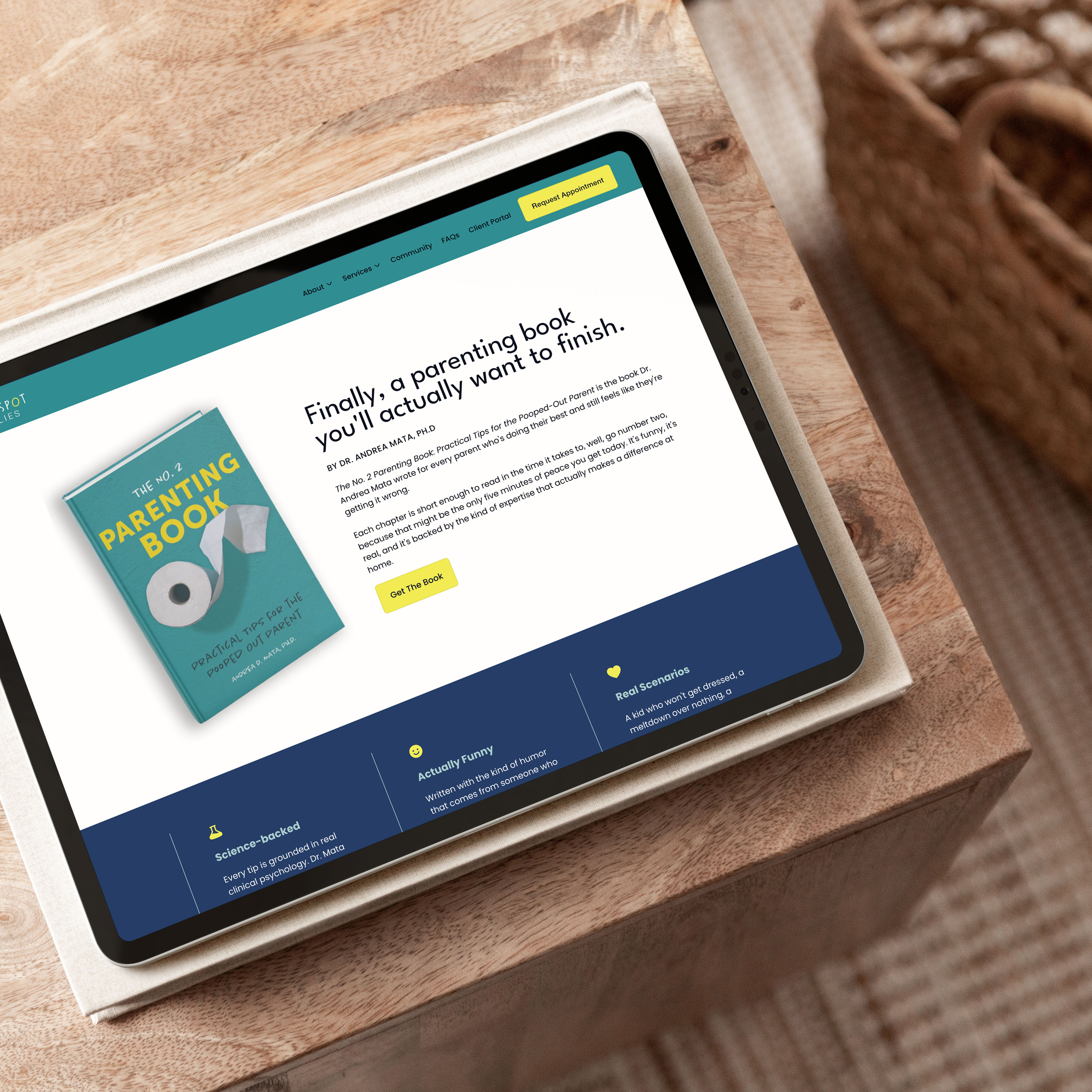 BrightSpot Families book page design shown on a tablet on a wood side table, with the headline "Finally, a parenting book you'll actually want to finish."