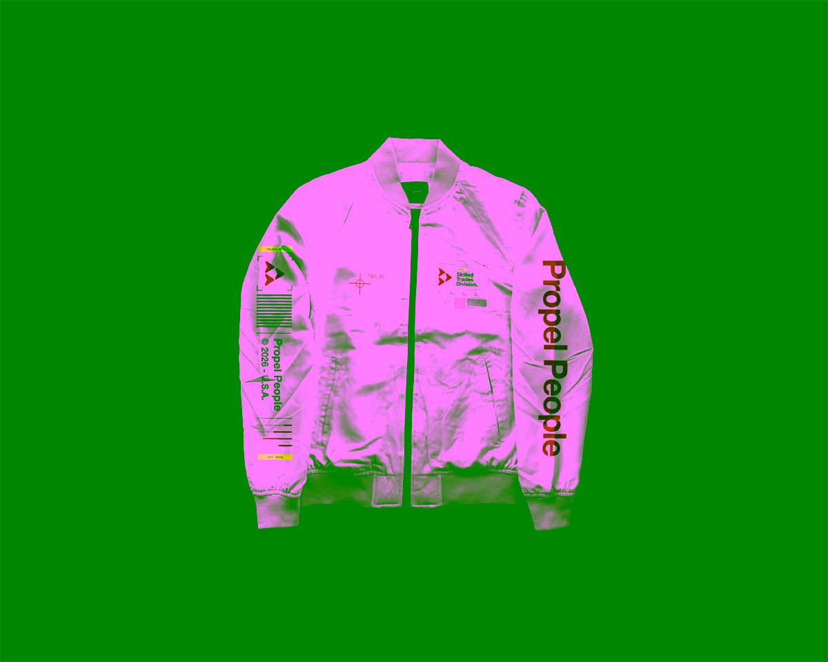 A white, technical jacket with Propel branding against a black background