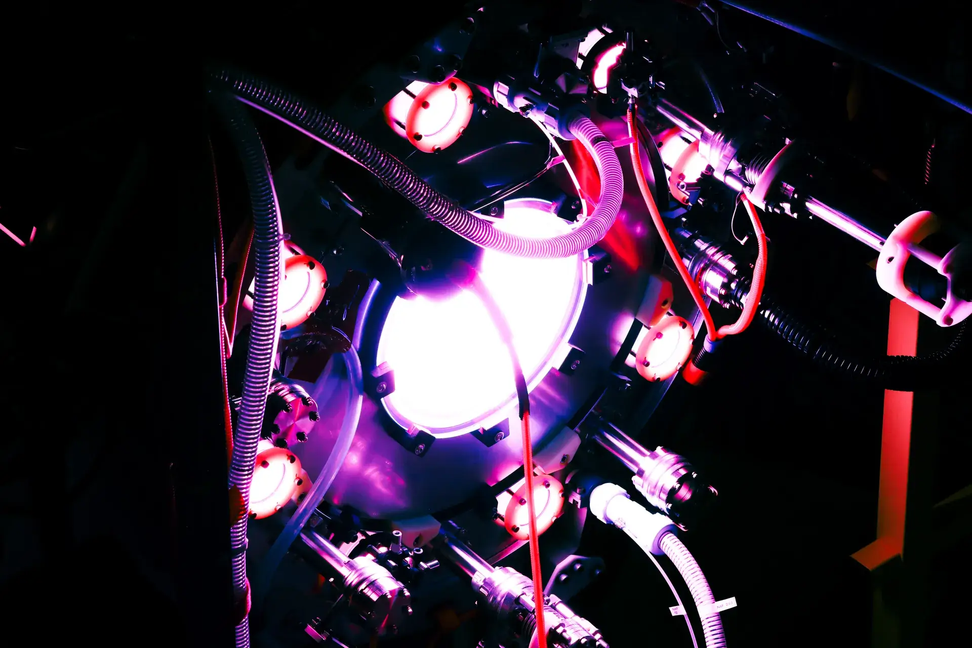 Close-up of Polaris with glowing circular lights and various cables and tubes attached.
