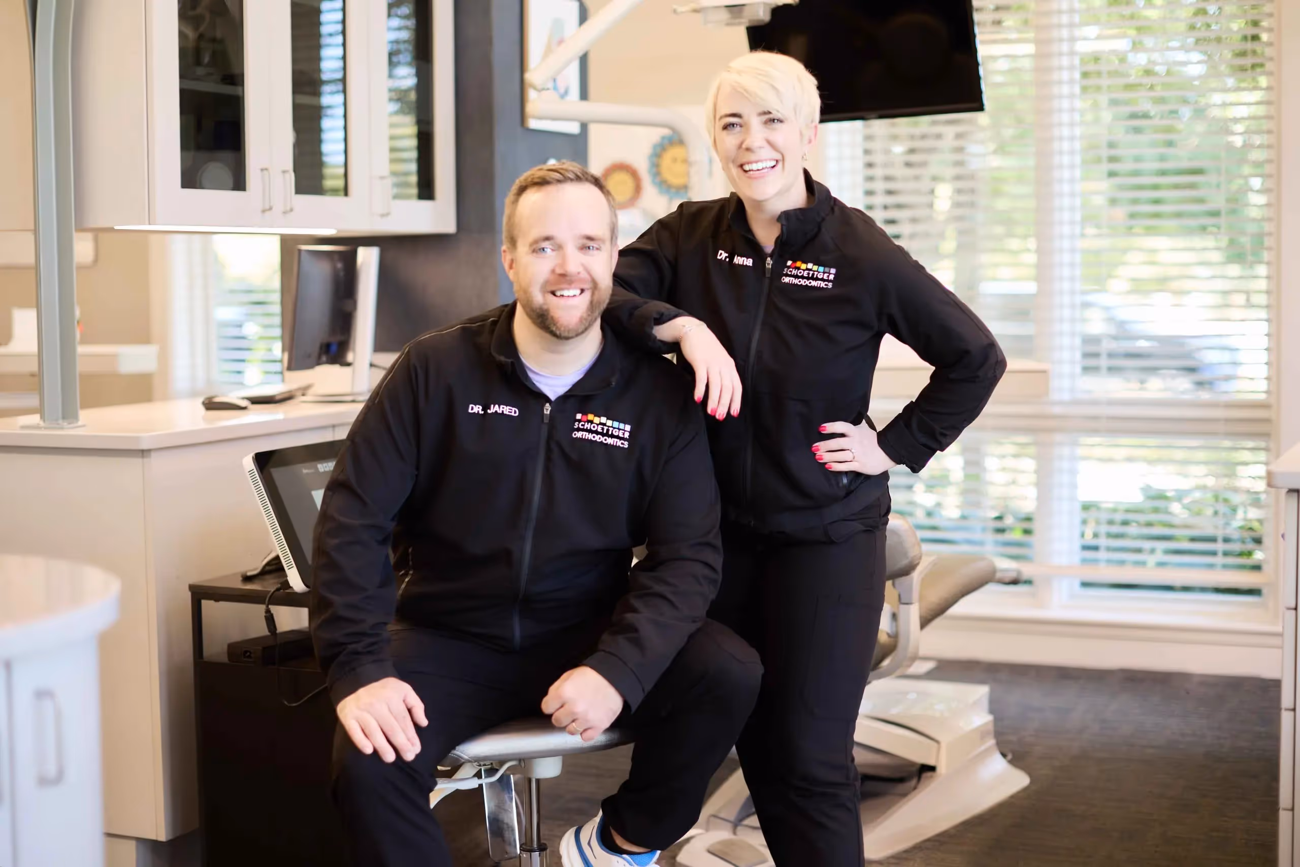 Board-certified orthodontist credential — Dr. Jared and Dr. Anna Schoettger
