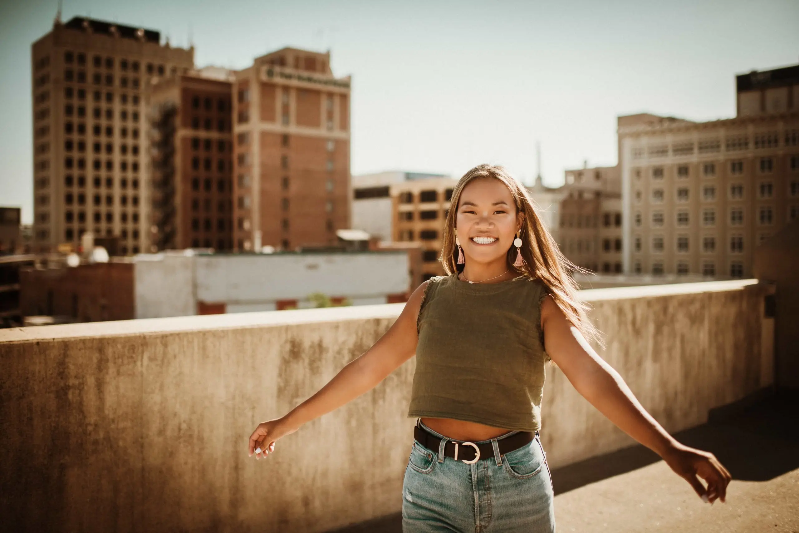 Schoettger Orthodontics patient smiling after braces or Invisalign treatment