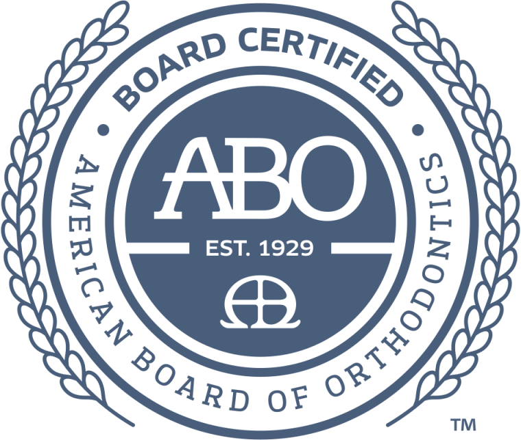 Seal with laurel wreath and text Board Certified American Board of Orthodontics ABO Est. 1929