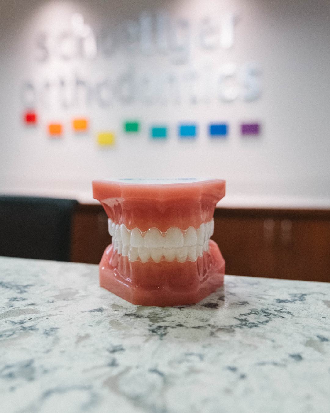 A set of invisalign trays modeled on teeth.