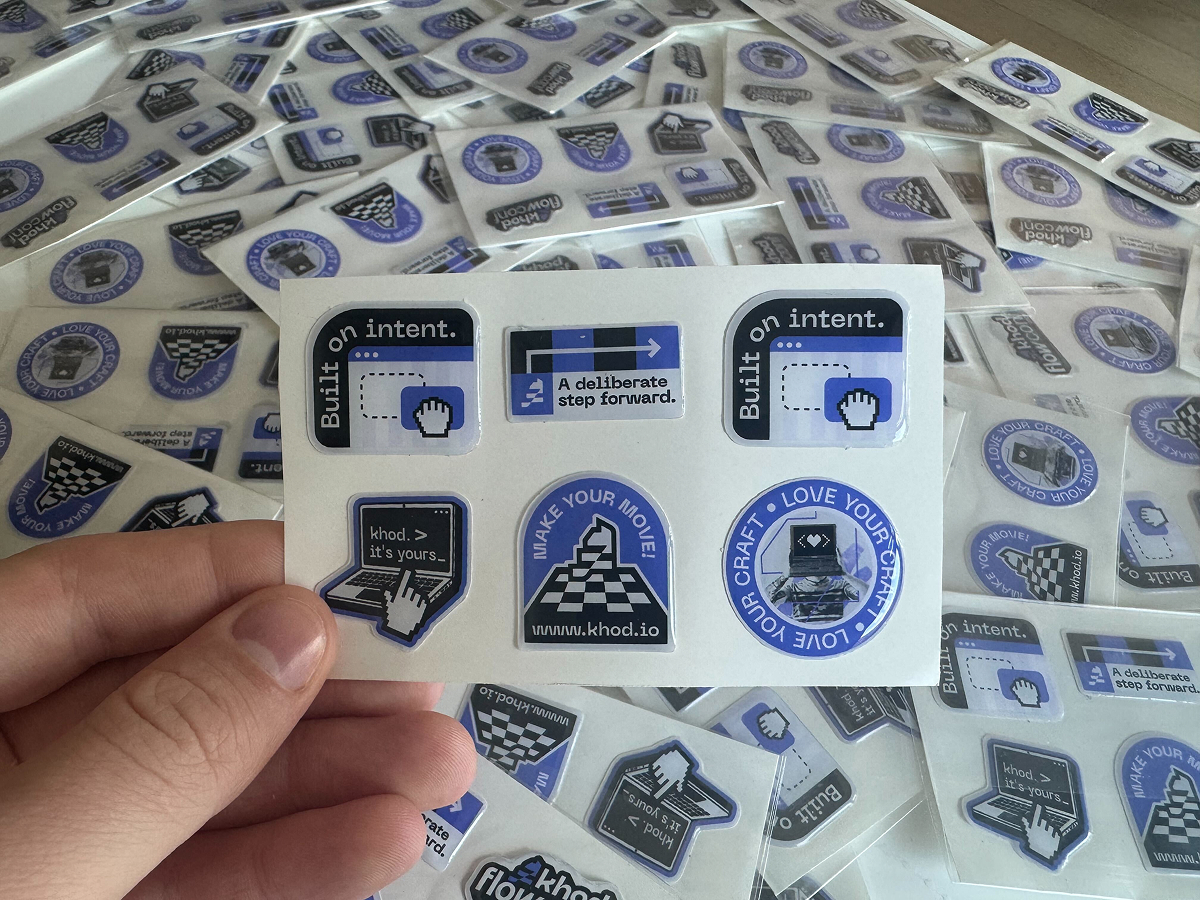 Khod merch at flowConf 2026. The 3D stickers did their job.