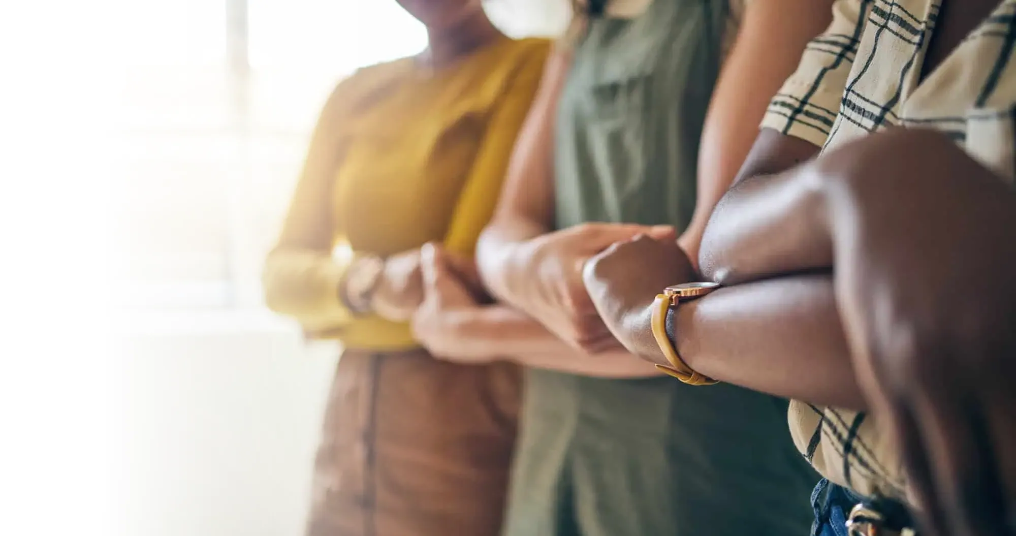 A group of people standing next to each other.