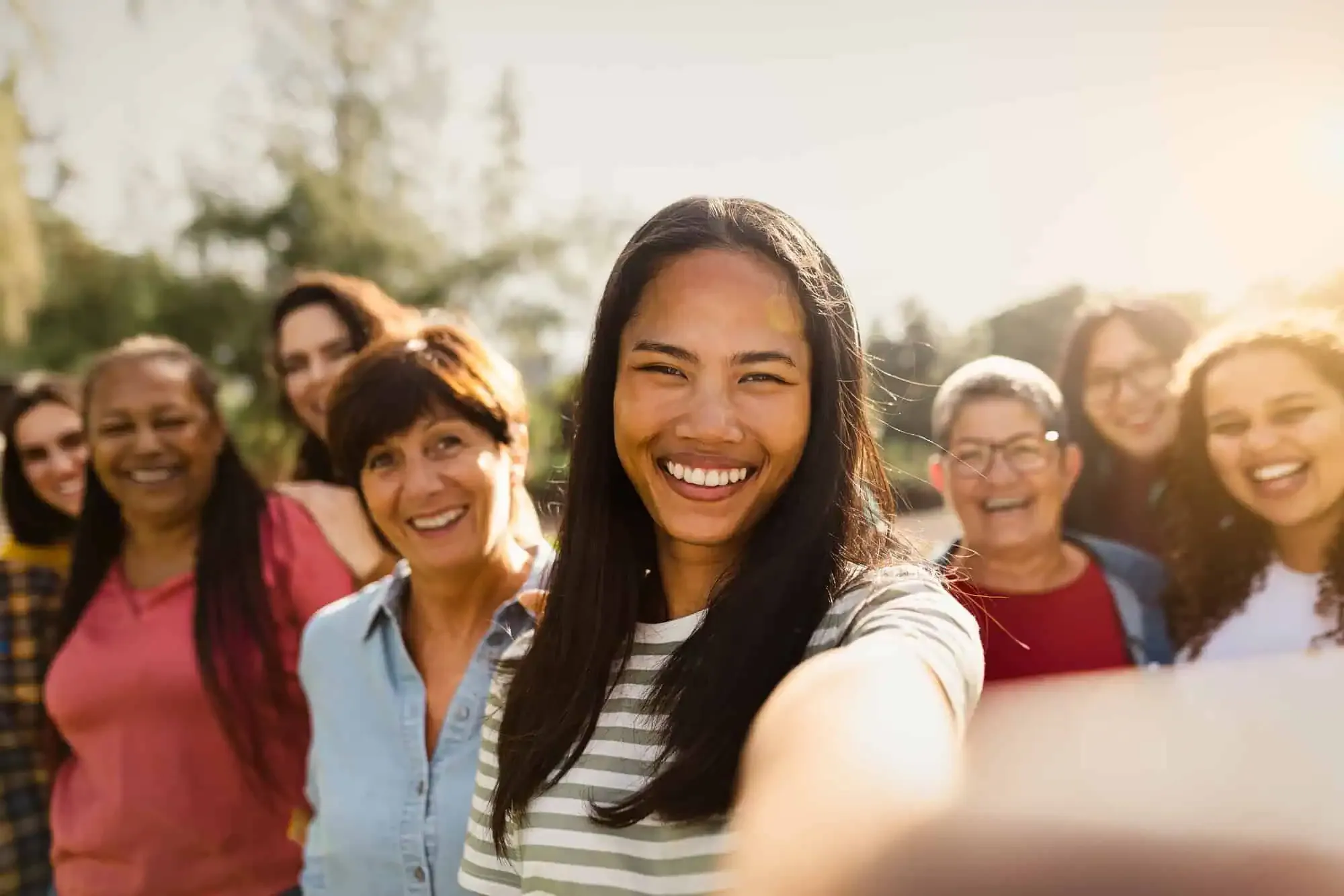 A group of women taking a picture together.