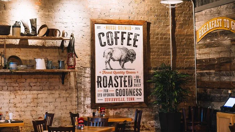 Interior signage about locally roasted coffee with a buffalo graphic