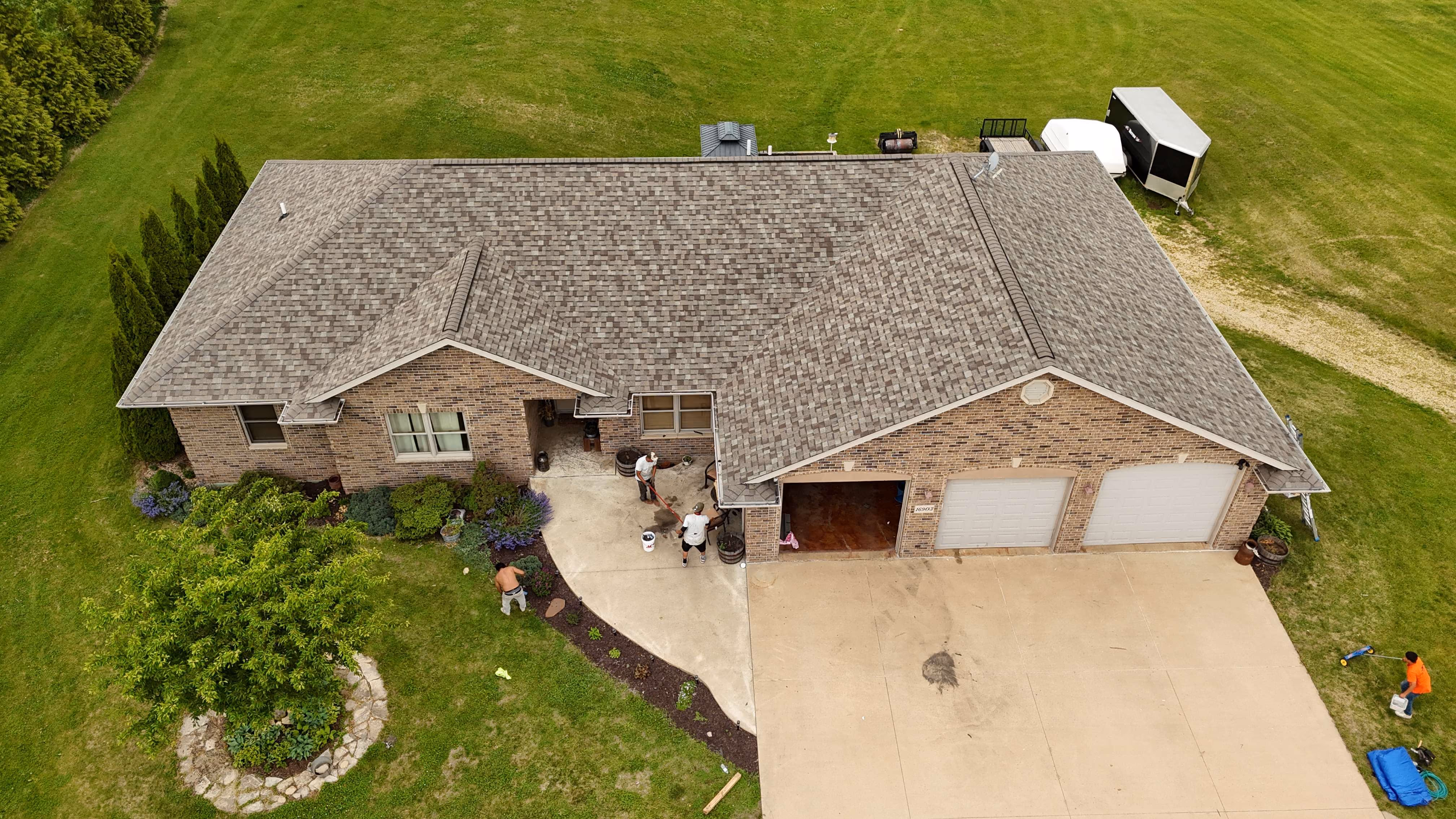 Aerial view of a completed roofing project by Passion Exteriors in Eastern Iowa
