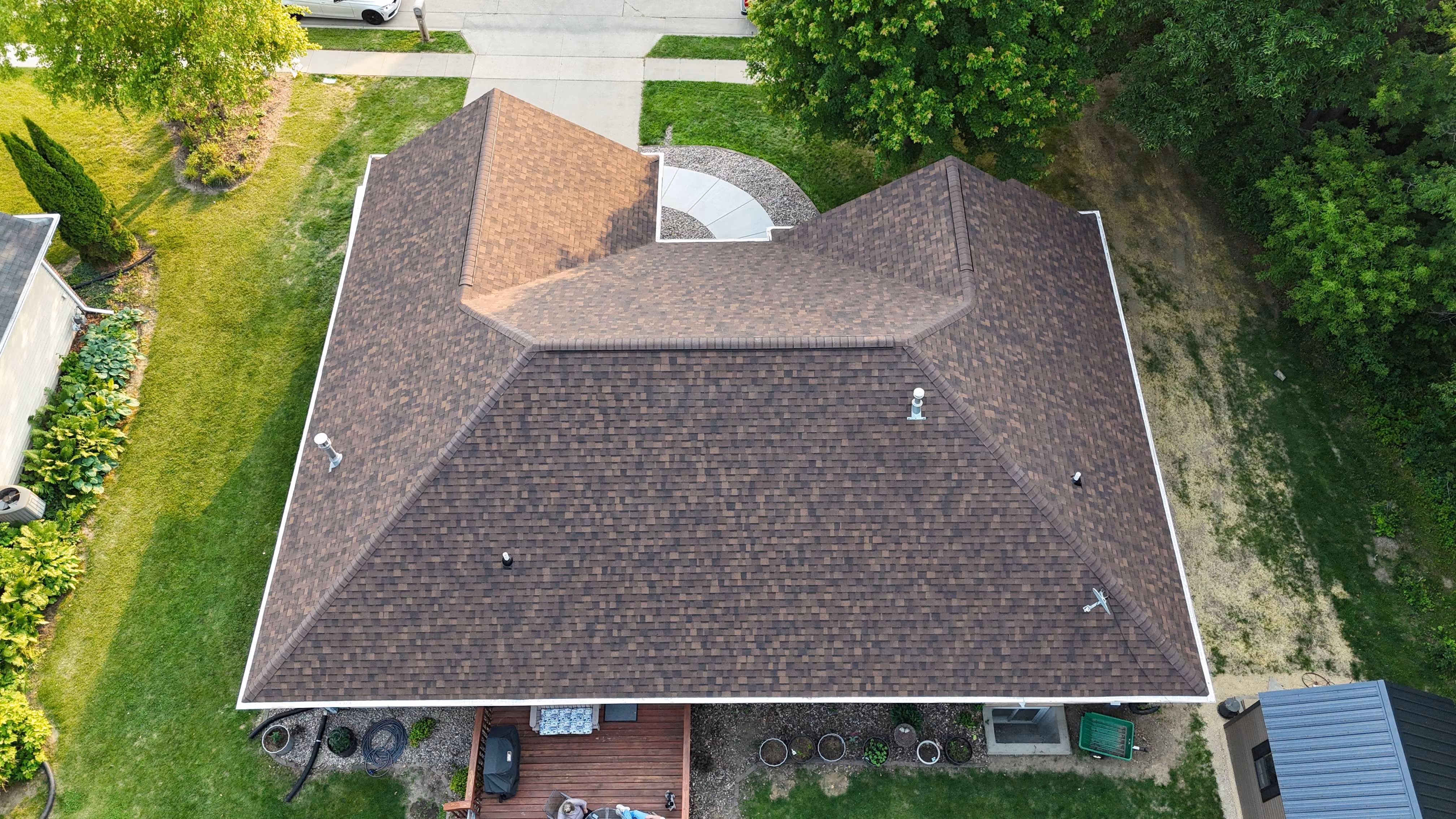 Aerial view of a completed roofing project by Passion Exteriors in Eastern Iowa