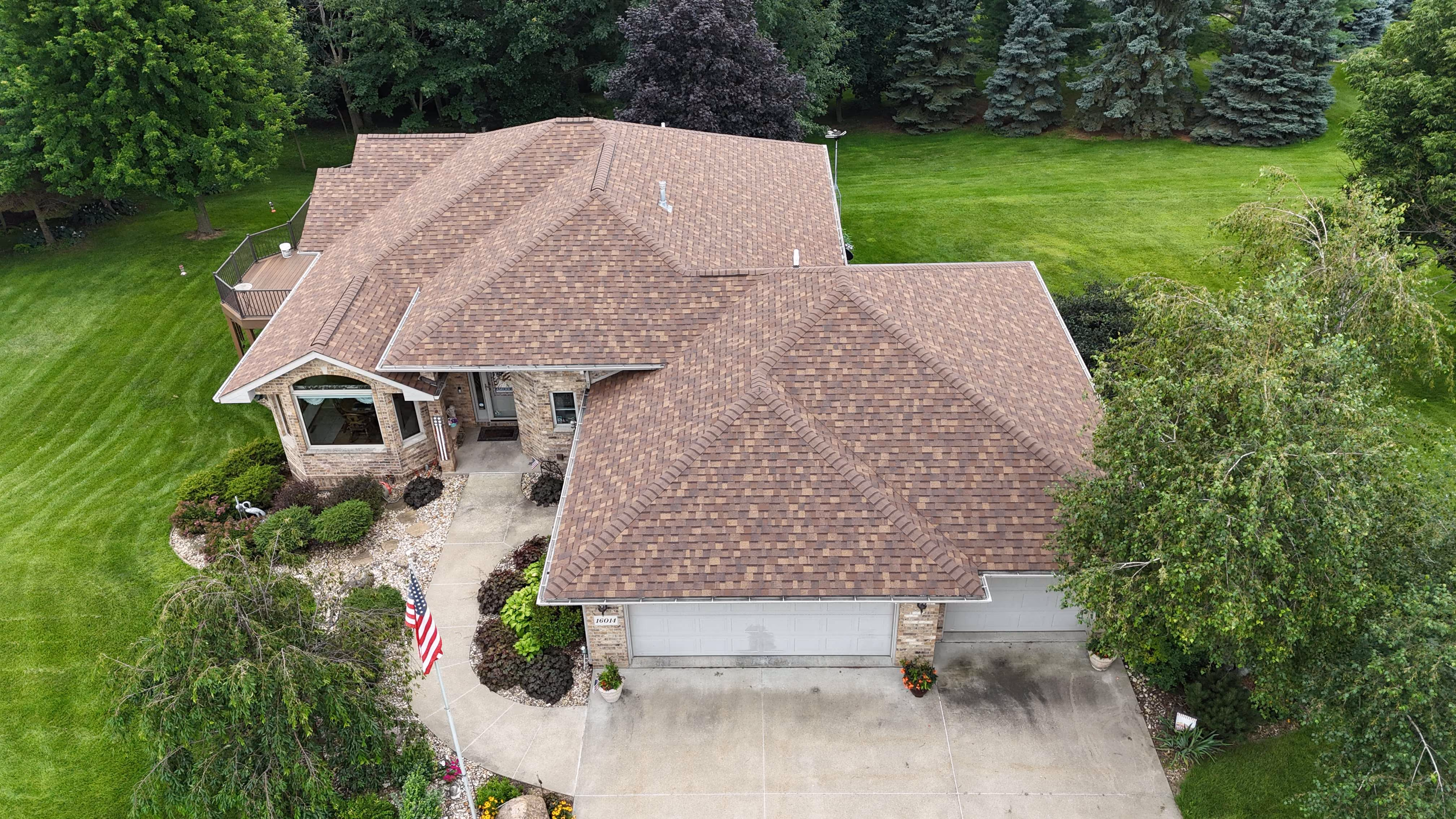 Aerial view of a completed roofing project by Passion Exteriors in Eastern Iowa