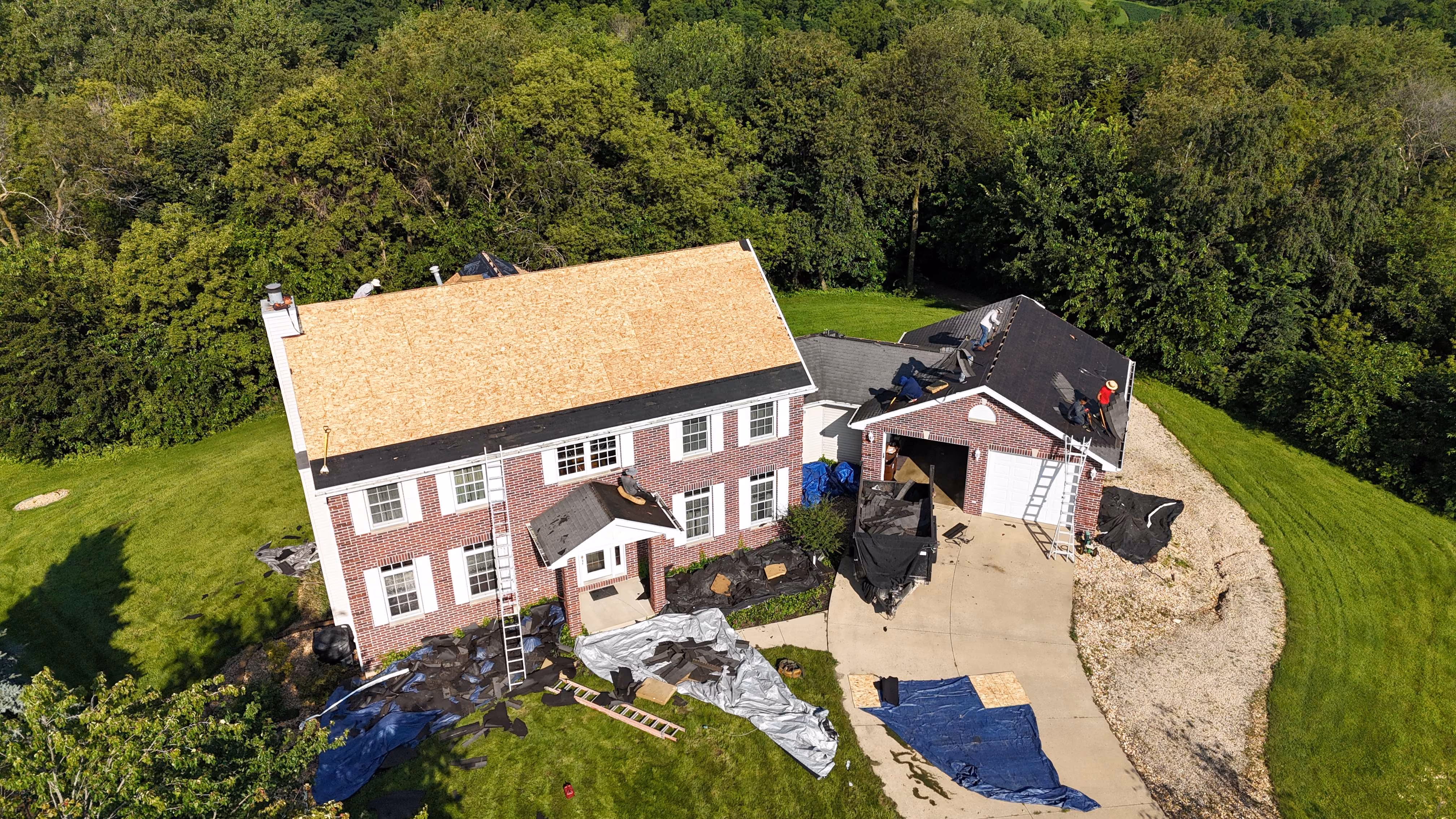 Aerial view of a completed roofing project by Passion Exteriors in Eastern Iowa