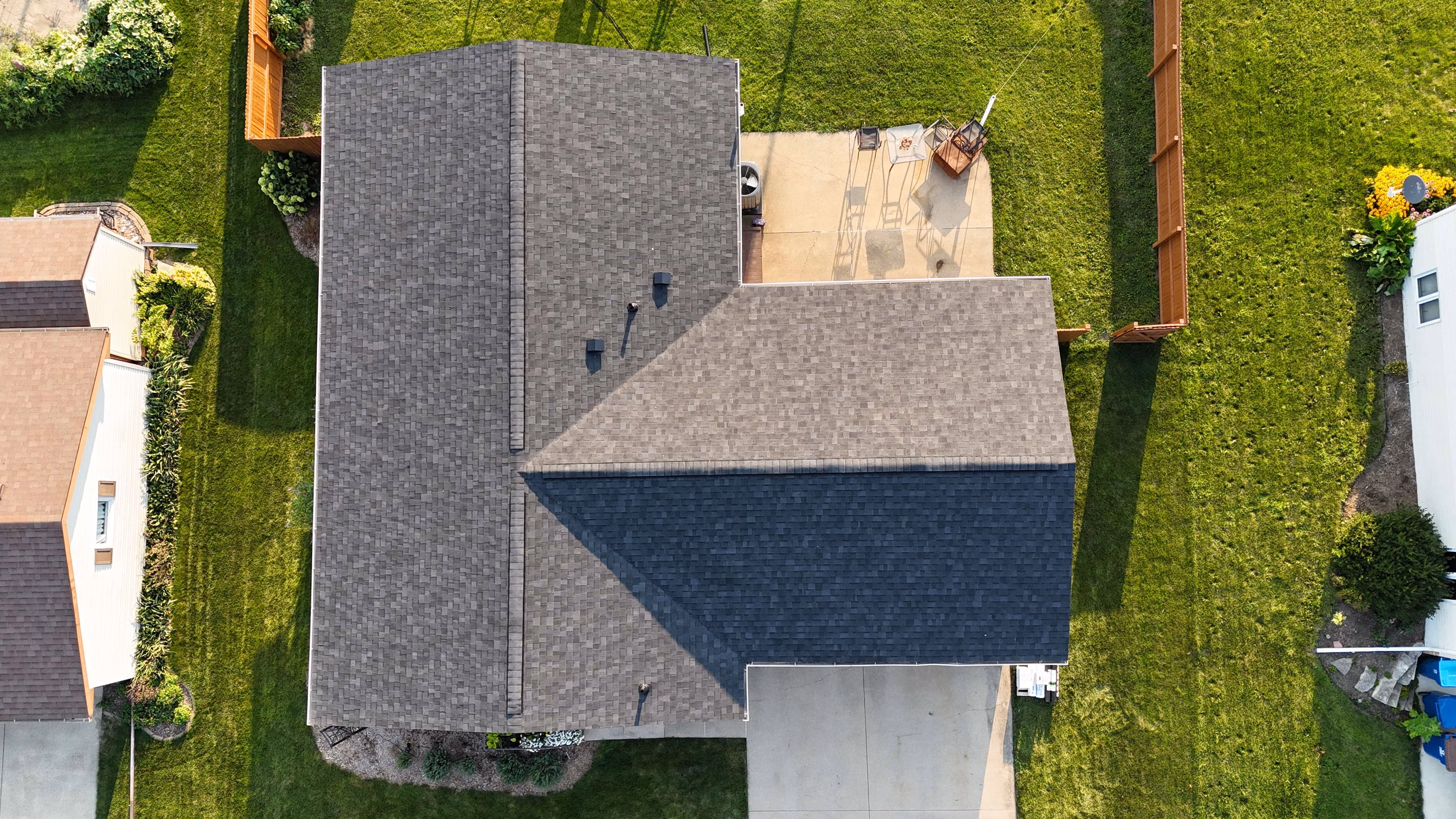 Aerial view of a completed roofing project by Passion Exteriors in Eastern Iowa