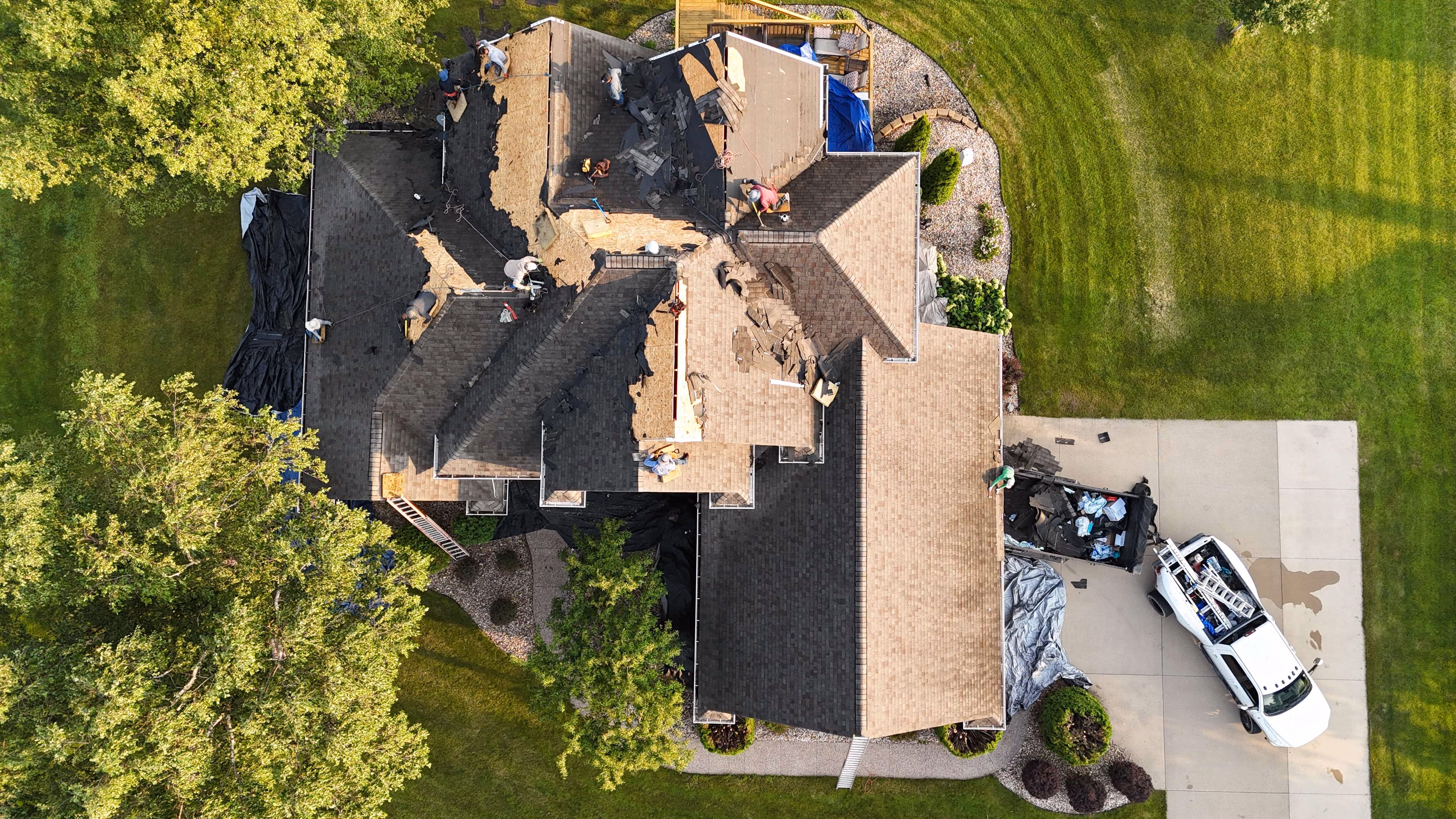 Aerial view of a completed roofing project by Passion Exteriors in Eastern Iowa