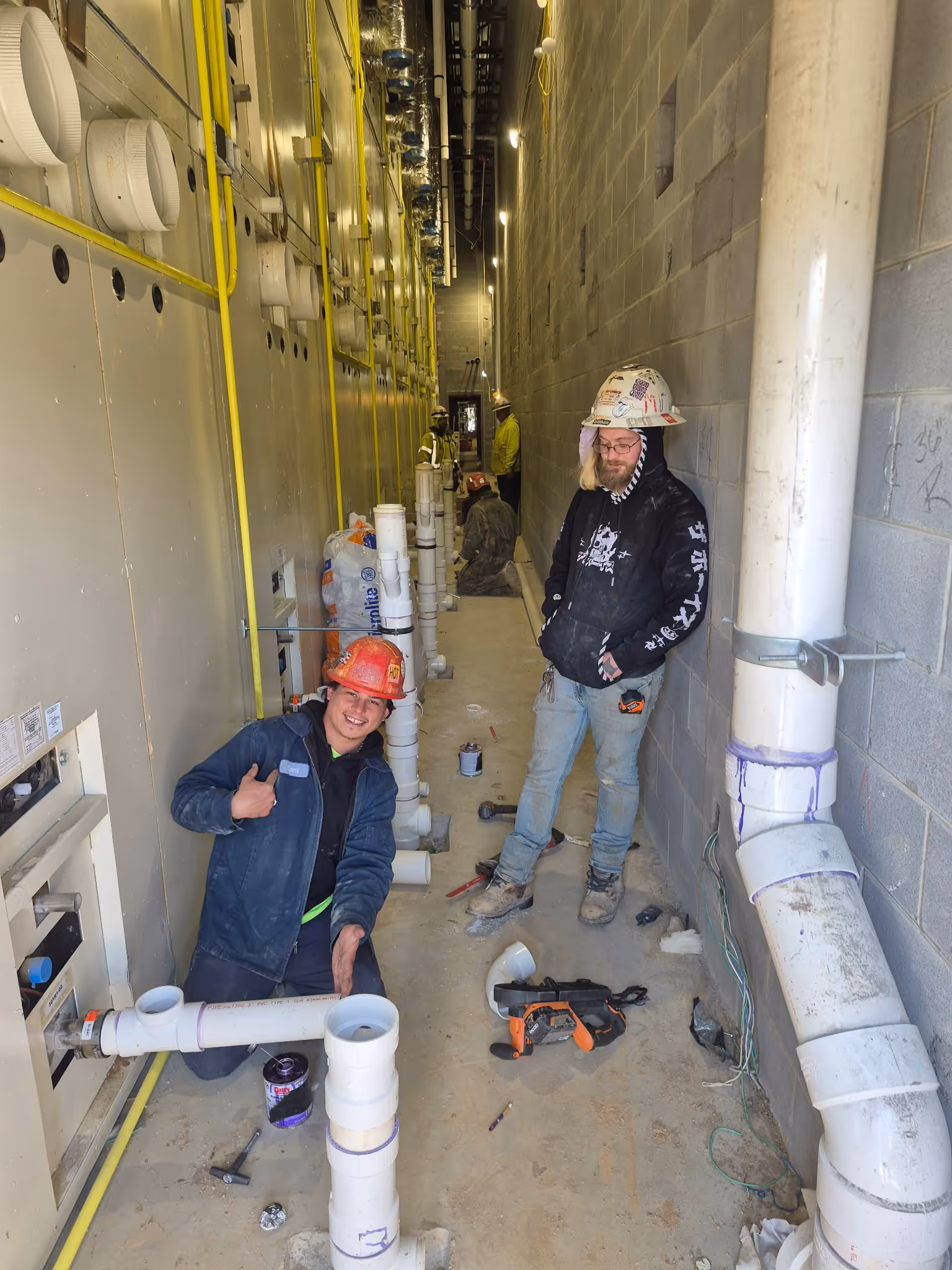 Plumbing Repairs in Gastonia NC with expert technicians repairing commercial plumbing systems.