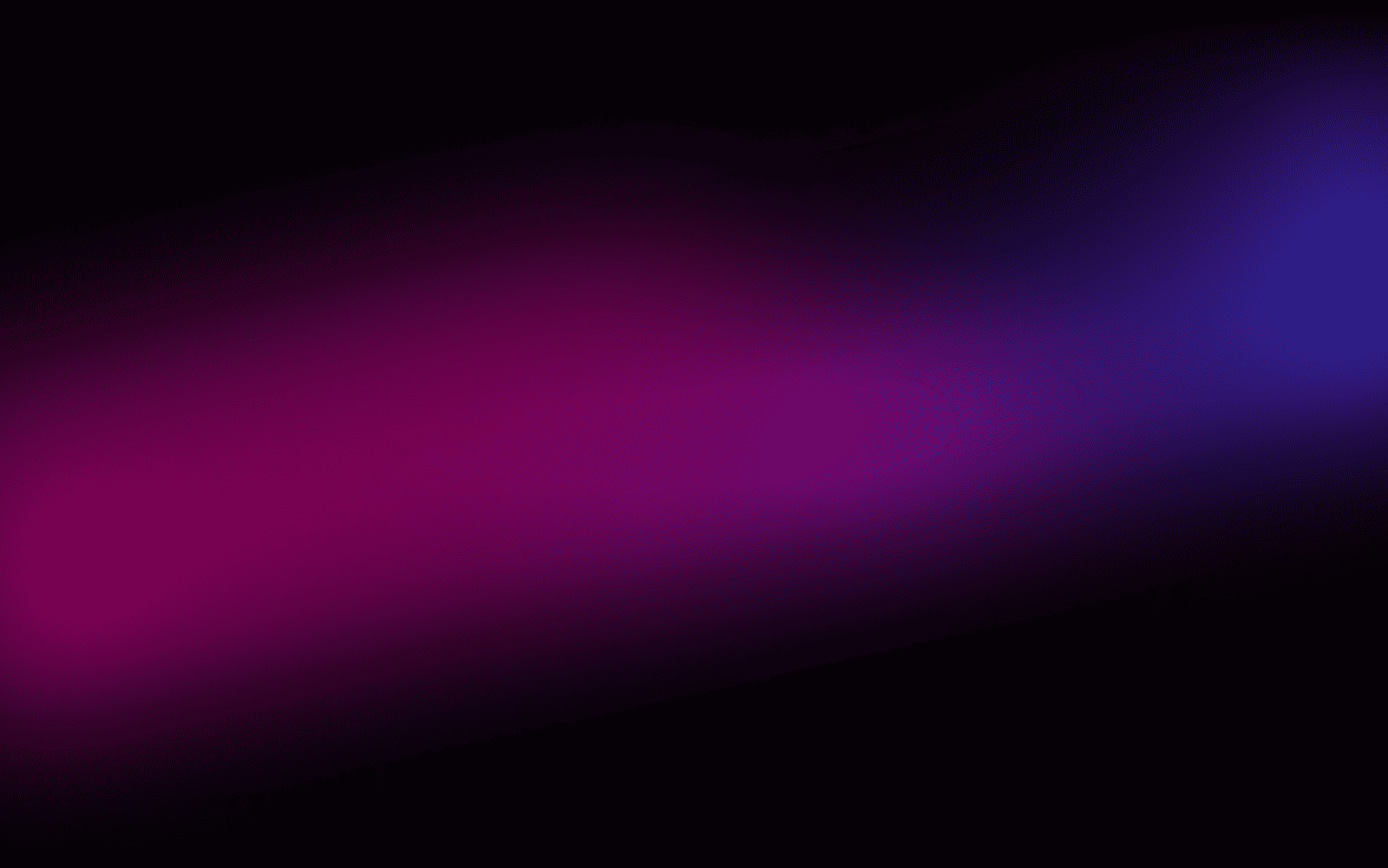 Abstract gradient background with dark shades blending into purple and blue hues fading horizontally.